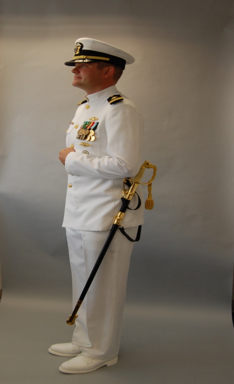 dress blues usmc nco sword Marine Corps Sword Detail is a ceremonial unit responsible for formal drill and sword movements during official events. The archival image documents preparation activities for a Marine Corps Birthday Ball ceremony held